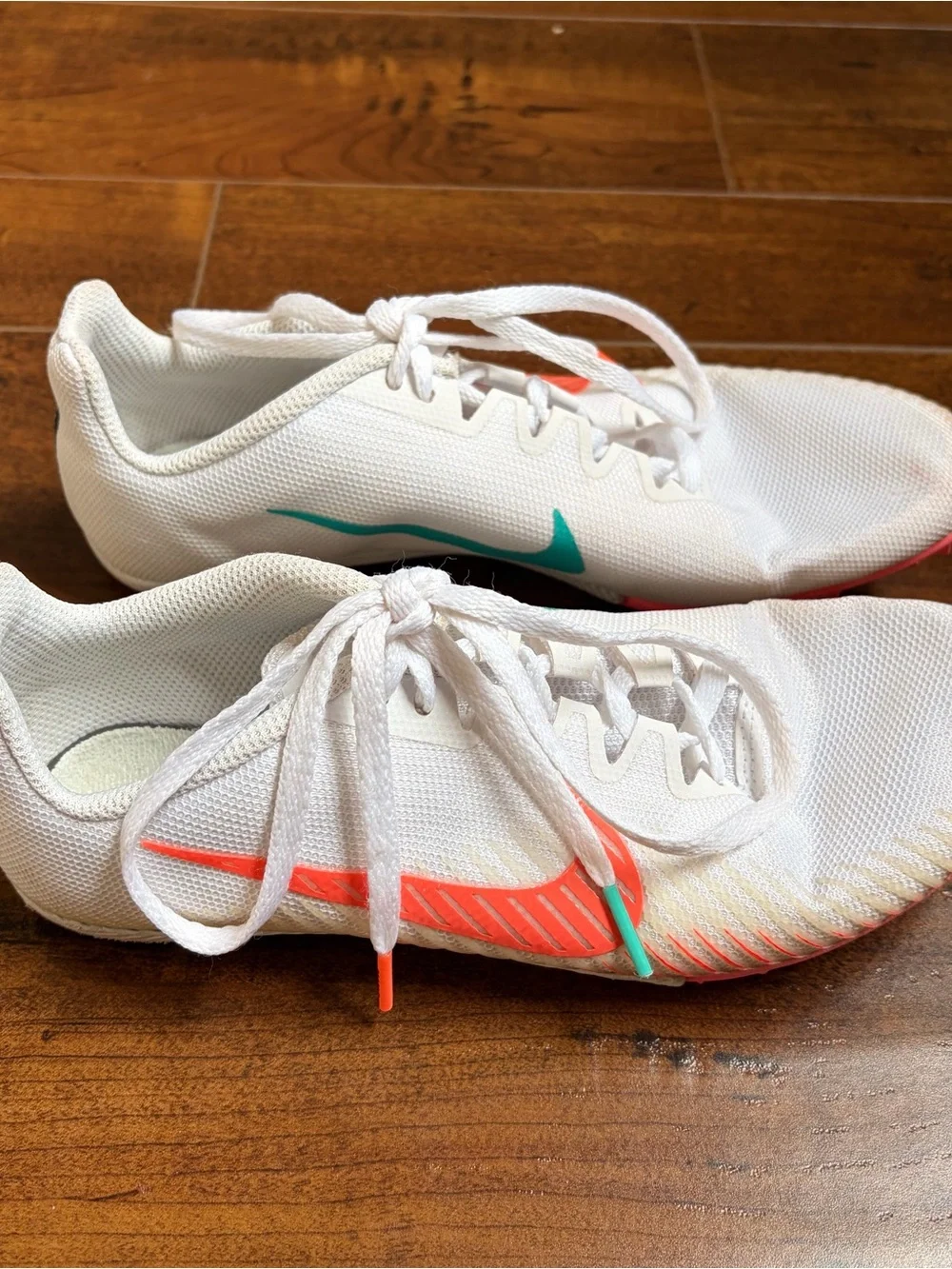 Nike Women’s White Track Spikes with Coral & Teal Accents